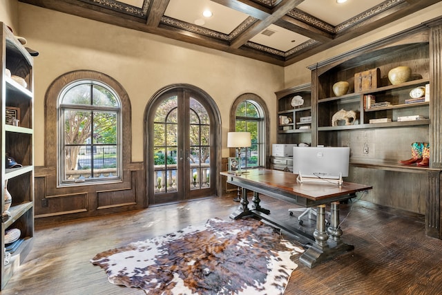 office featuring french doors, beam ceiling, coffered ceiling, and a healthy amount of sunlight