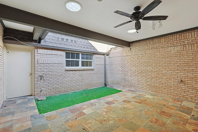 view of patio / terrace featuring ceiling fan