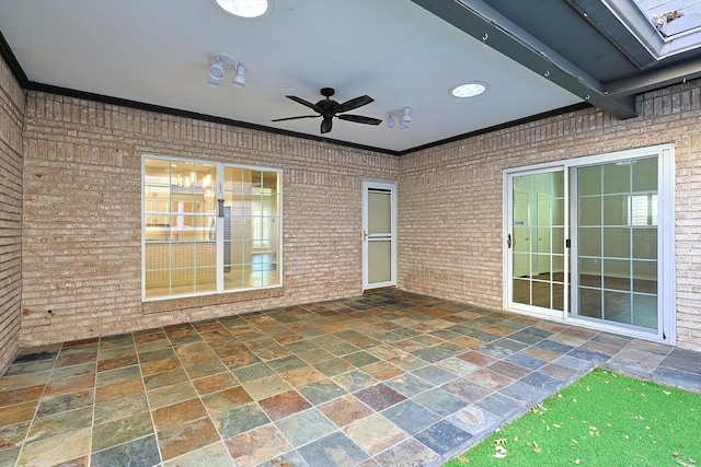 view of patio featuring a ceiling fan
