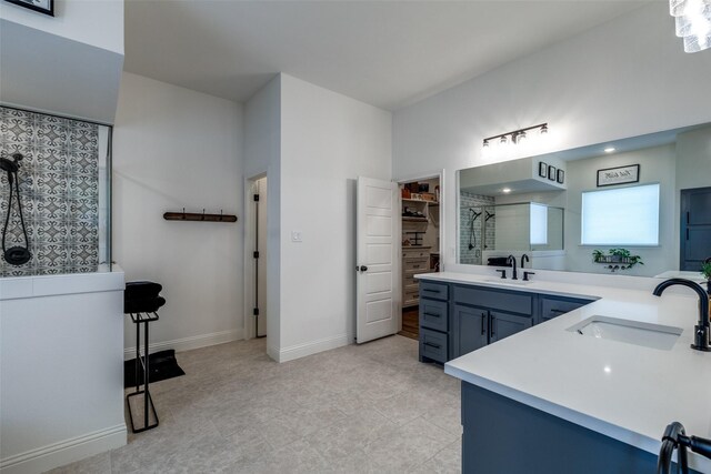 120 Southern Ct, Springtown, TX 76082 - full bath with baseboards, vanity, a walk in closet, and a tile shower