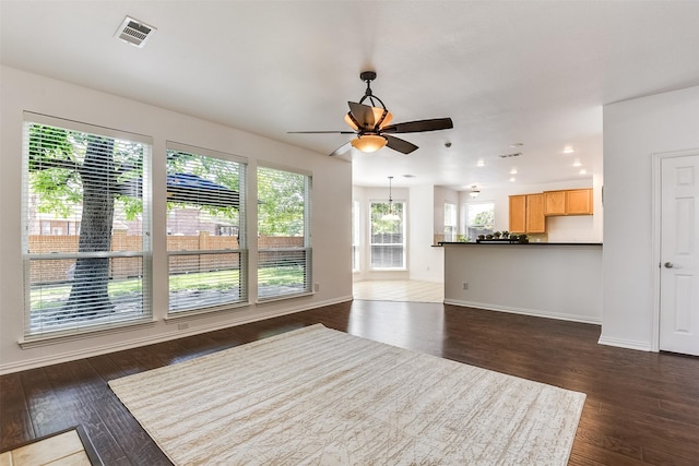 6807 Lagoon Dr, Grand Prairie, TX 75054 - unfurnished living room with dark wood-style floors, ceiling fan, recessed lighting, and baseboards