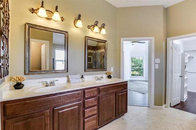 6807 Lagoon Dr, Grand Prairie, TX 75054 - full bathroom with a ceiling fan, double vanity, and tile patterned floors