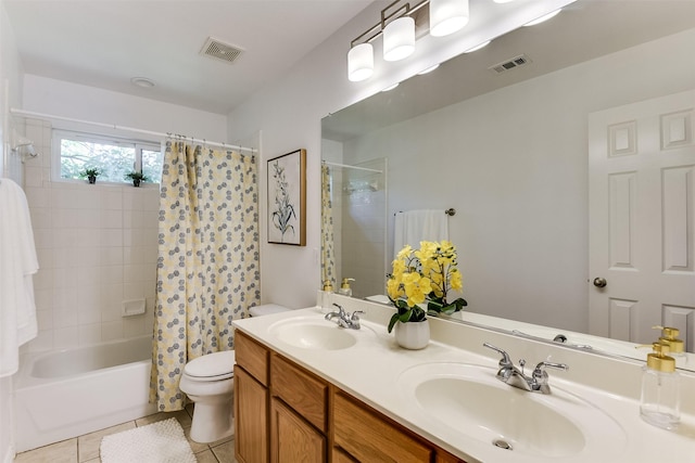 6807 Lagoon Dr, Grand Prairie, TX 75054 - bathroom with toilet, tile patterned floors, shower / tub combo, and double vanity