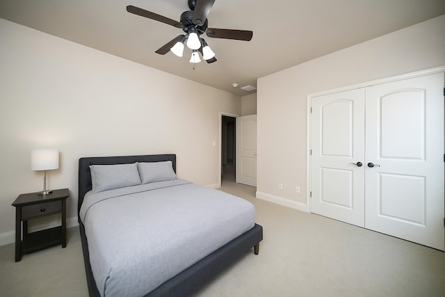 2905 White Dove Dr, Plano, TX 75093 - bedroom featuring light carpet, a closet, and a ceiling fan