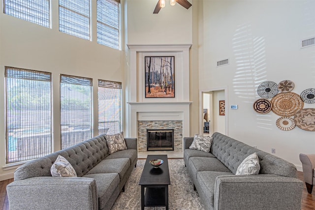 7905 Vista Ridge Dr S, Fort Worth, TX 76132 - living area with wood finished floors, a high ceiling, ceiling fan, and visible vents