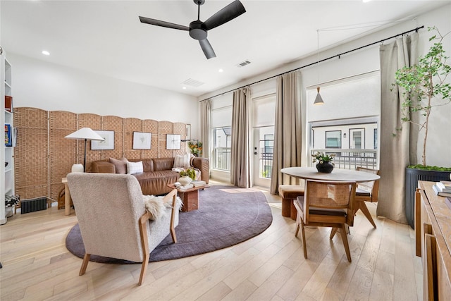 interior space with recessed lighting, visible vents, light wood finished floors, and ceiling fan