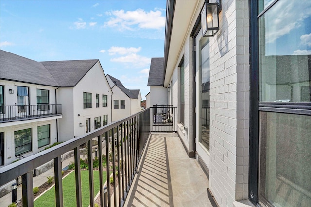 balcony featuring a residential view