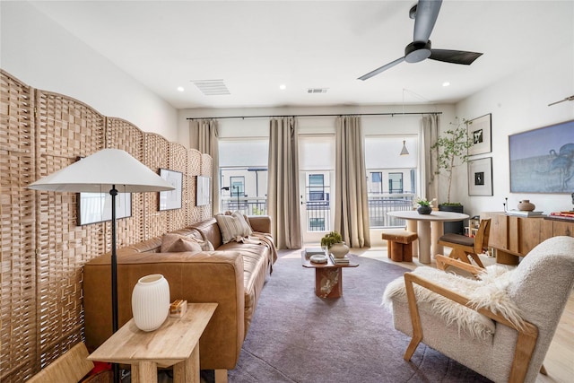 interior space with a ceiling fan, visible vents, carpet, and recessed lighting