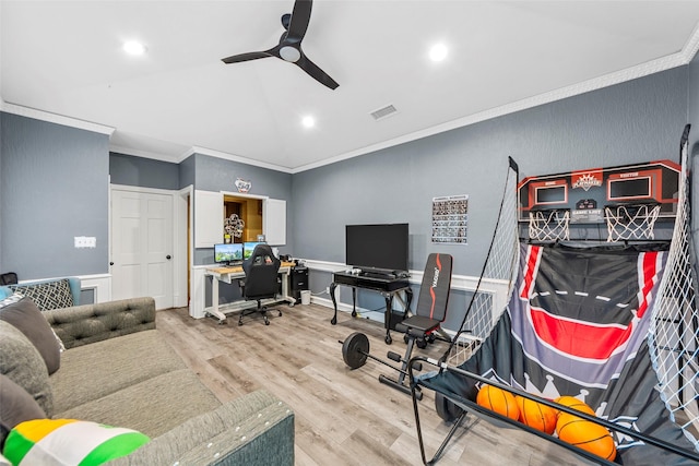 office space featuring a ceiling fan, wood finished floors, ornamental molding, visible vents, and recessed lighting