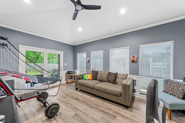 living room featuring a wainscoted wall, recessed lighting, a ceiling fan, wood finished floors, and crown molding