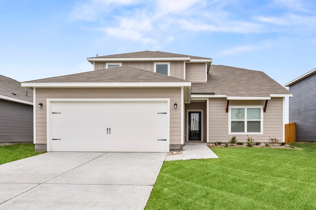 view of front of home featuring an attached garage, a front lawn, concrete driveway, and roof with shingles