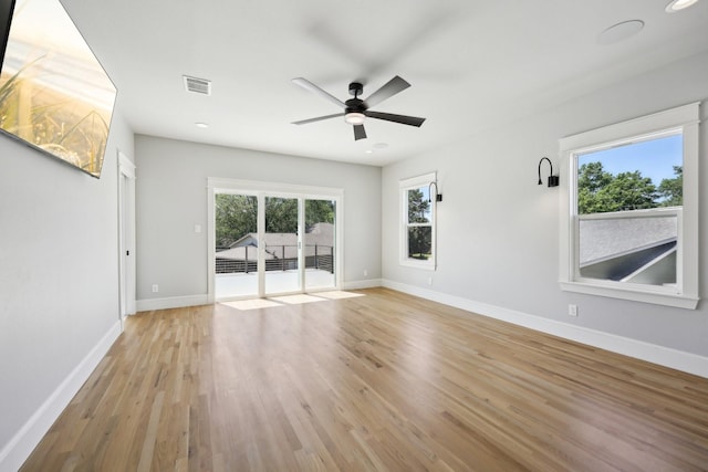 unfurnished living room with baseboards, visible vents, recessed lighting, light wood-style floors, and ceiling fan