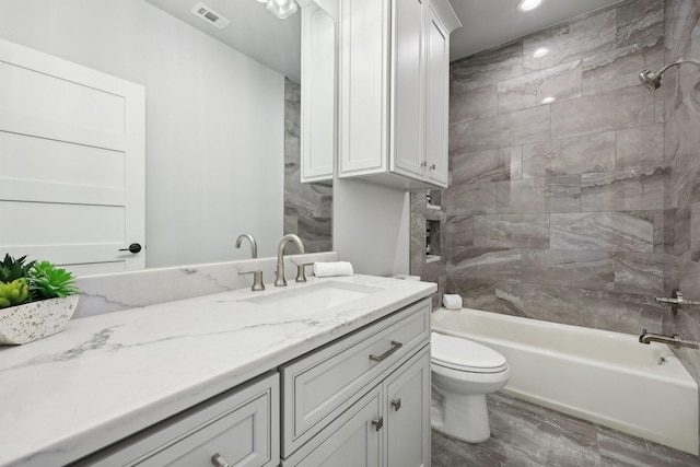 full bath with vanity, shower / washtub combination, toilet, visible vents, and recessed lighting