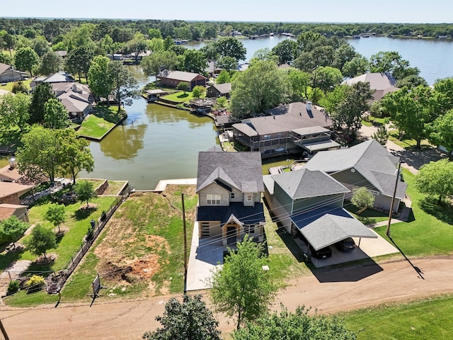bird's eye view with a water view and a residential view