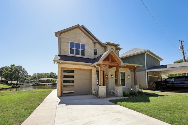 view of front of home with a garage, driveway, stone siding, and a front yard