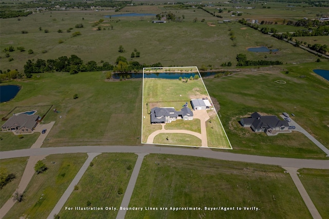 aerial view featuring a rural view and a water view