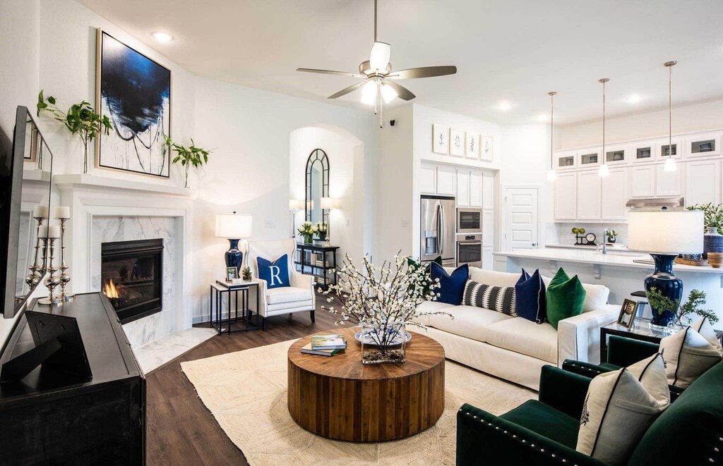 11333 Cider St, Fort Worth, TX 76052 - living room with a ceiling fan, a fireplace, recessed lighting, and wood finished floors