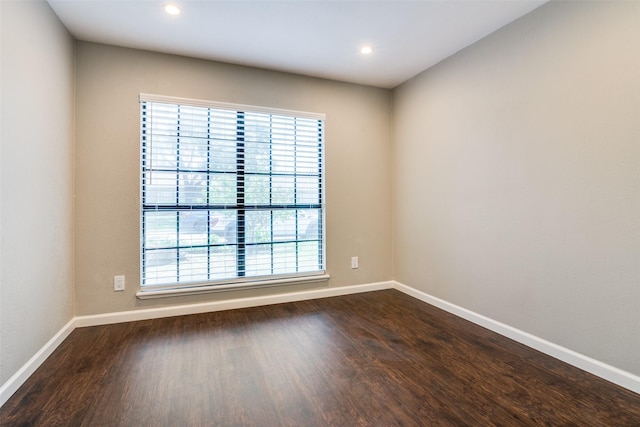 4430 Chapman St, The Colony, TX 75056 - unfurnished room with recessed lighting, baseboards, and dark wood-style floors