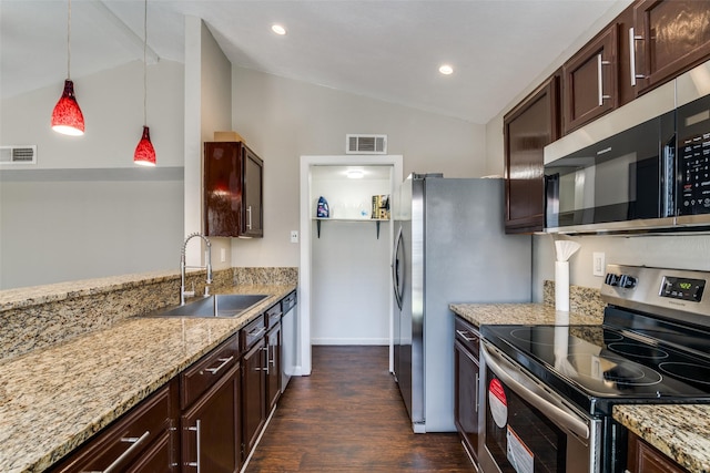 4430 Chapman St, The Colony, TX 75056 - kitchen with lofted ceiling, visible vents, a sink, and appliances with stainless steel finishes