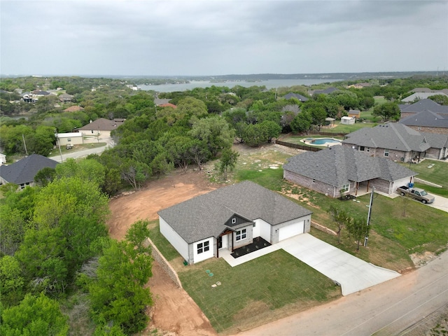 birds eye view of property with a residential view