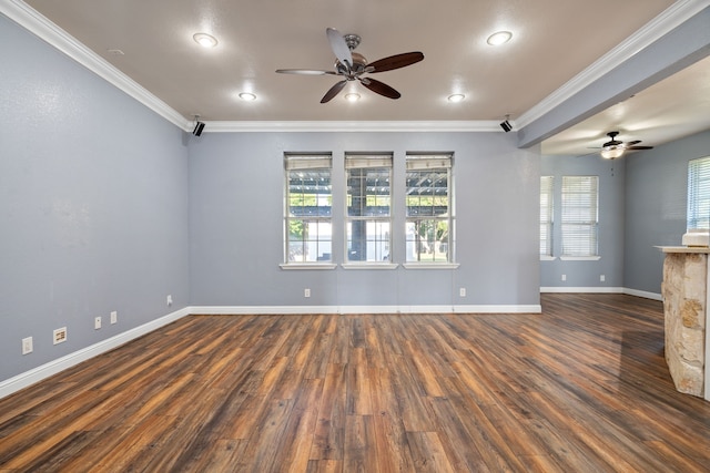 spare room with wood finished floors, ceiling fan, and crown molding