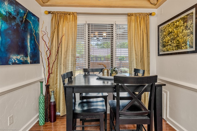 dining room with wood finished floors and baseboards