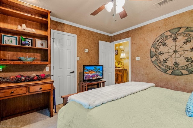 carpeted bedroom with ceiling fan, ornamental molding, and visible vents