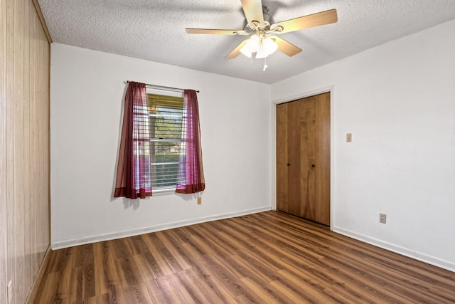 314 Cedar, Mount Pleasant, TX 75455 - spare room featuring wood finished floors, a textured ceiling, and a ceiling fan