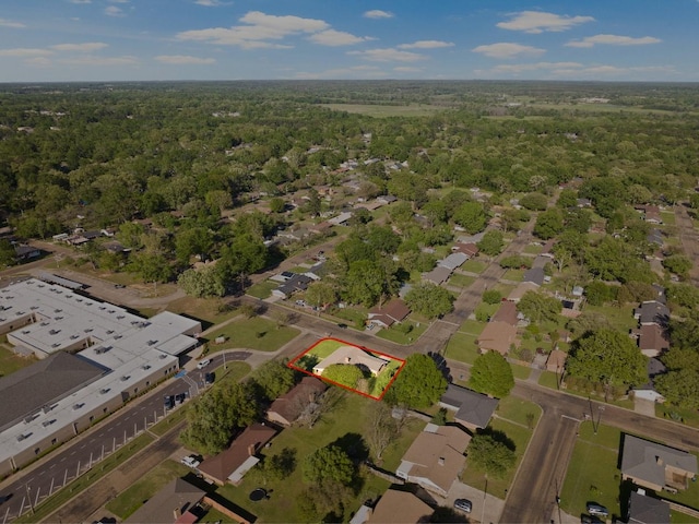 314 Cedar, Mount Pleasant, TX 75455 - aerial view featuring a wooded view