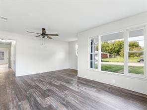 unfurnished living room with ceiling fan and wood finished floors