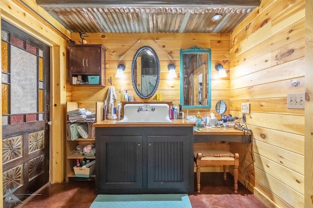 bathroom featuring wooden ceiling, wood walls, and concrete floors