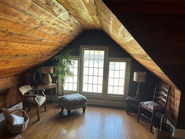 living area featuring wood-type flooring, vaulted ceiling, and wooden ceiling