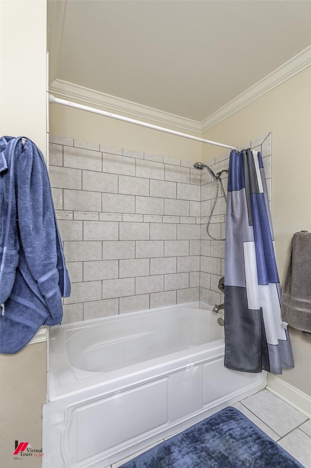 full bath with tile patterned floors, shower / bath combo with shower curtain, baseboards, and ornamental molding