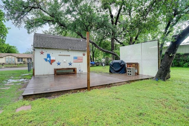 view of shed with fence