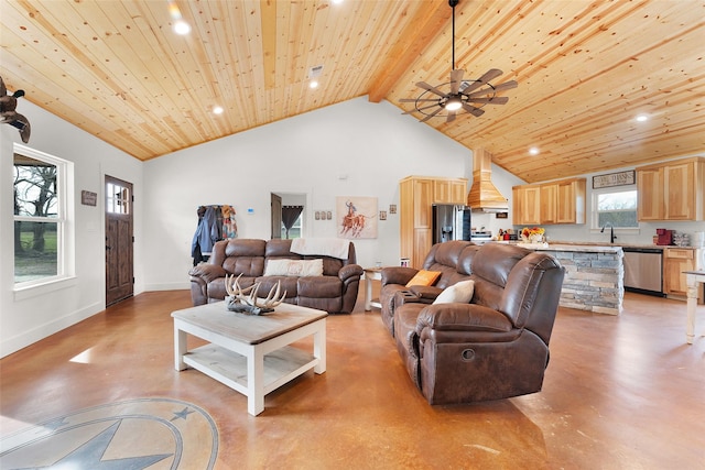 living area with recessed lighting, finished concrete flooring, a ceiling fan, wood ceiling, and high vaulted ceiling