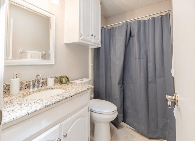 full bath featuring a shower with curtain, tile patterned floors, vanity, and toilet