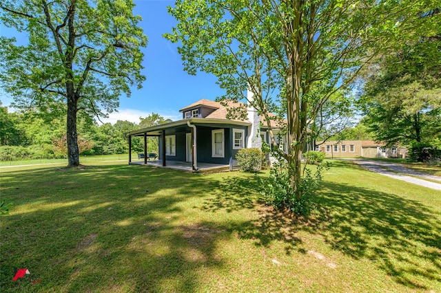 view of front of home featuring a front lawn