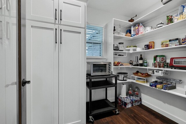 storage area featuring a toaster