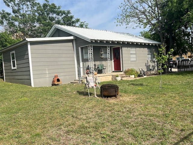 108 E Neely Ave, Comanche, TX 76442 - ranch-style home with a front yard and metal roof