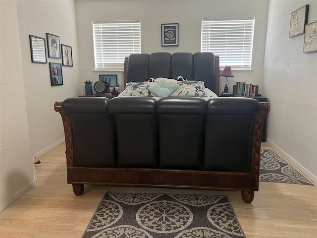 108 E Neely Ave, Comanche, TX 76442 - living area featuring wood finished floors and baseboards