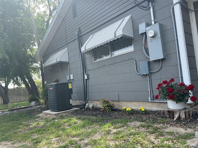 108 E Neely Ave, Comanche, TX 76442 - view of side of property featuring central AC unit and fence