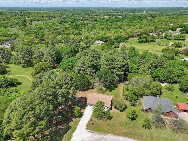 aerial view with a wooded view