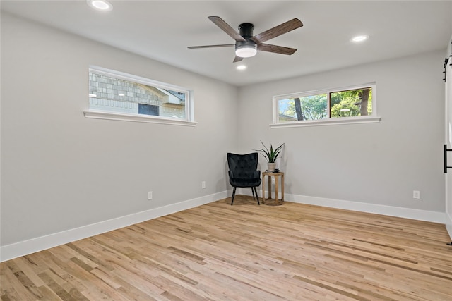 unfurnished room featuring wood finished floors and recessed lighting