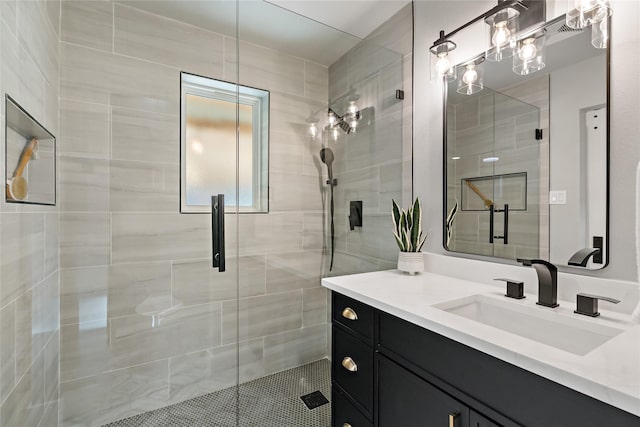 full bath featuring vanity and a stall shower