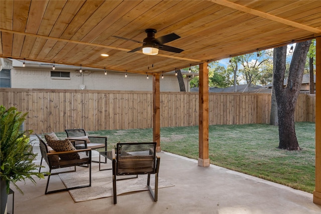 view of patio / terrace featuring outdoor lounge area, a fenced backyard, and ceiling fan