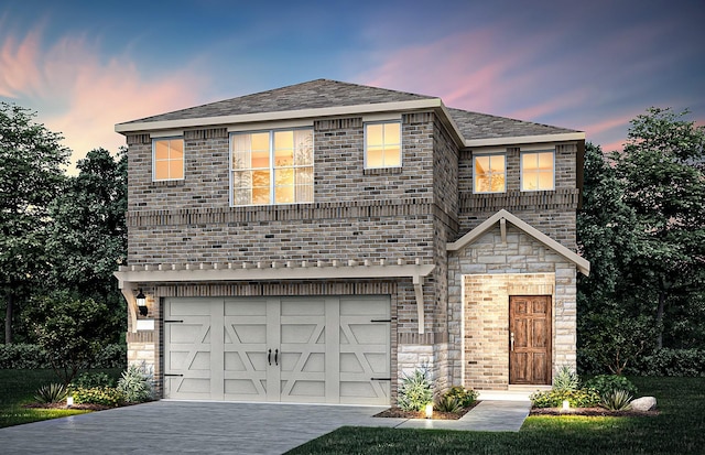 view of front facade featuring an attached garage, driveway, and brick siding