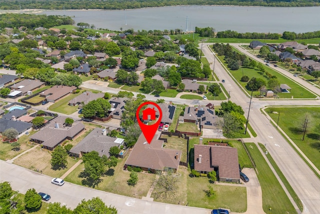 aerial view with a residential view and a water view
