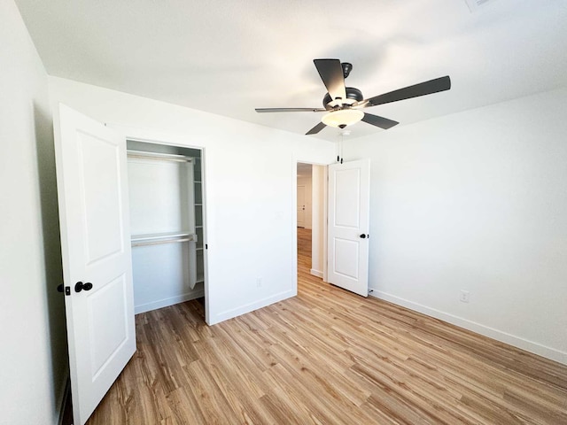 2408 Miller St, Denison, TX 75020 - unfurnished bedroom with ceiling fan, baseboards, a closet, and light wood-style flooring