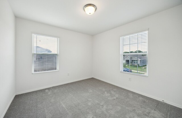 7108 Pederson Creek Way, Denton, TX 76208 - carpeted empty room featuring baseboards