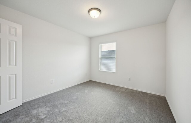 7108 Pederson Creek Way, Denton, TX 76208 - spare room featuring carpet flooring and baseboards